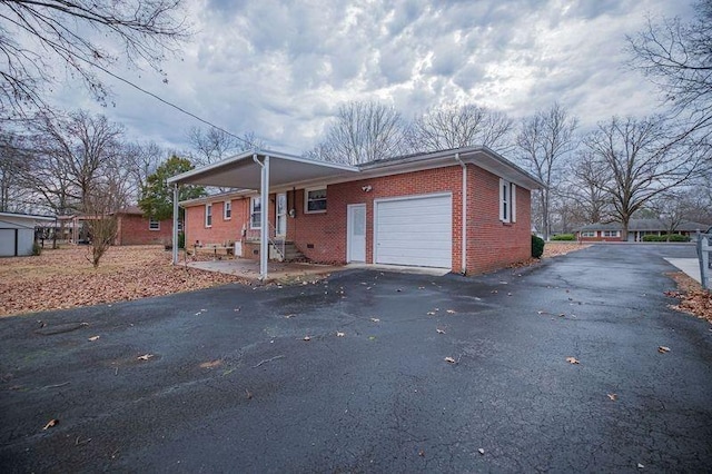 view of front of home featuring a garage