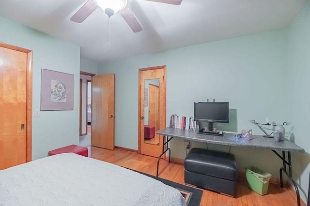 bedroom featuring wood-type flooring and ceiling fan