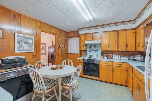 kitchen with range with electric cooktop, dishwashing machine, a textured ceiling, and wood walls