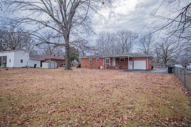 ranch-style house with a shed