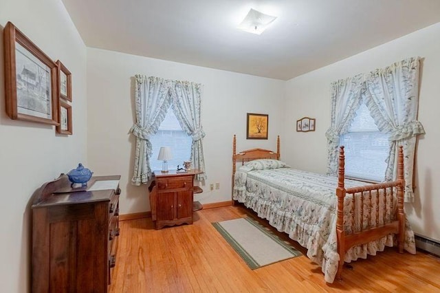 bedroom featuring hardwood / wood-style flooring