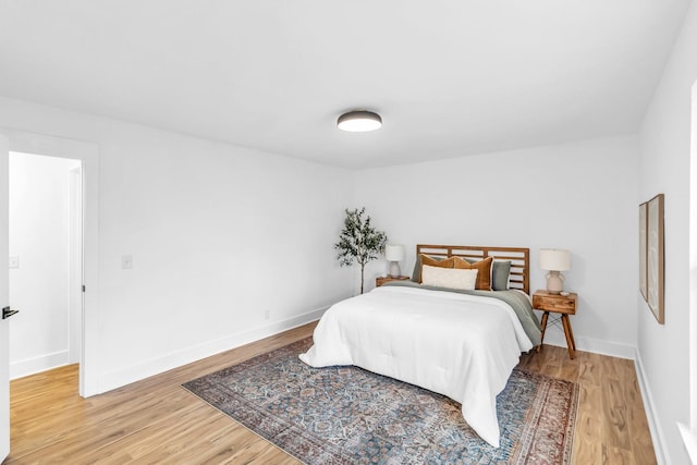 bedroom featuring hardwood / wood-style floors