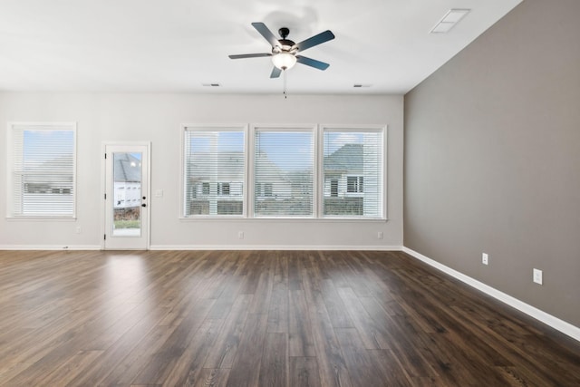 empty room featuring dark hardwood / wood-style floors and ceiling fan