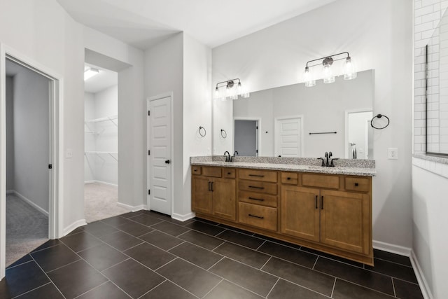 bathroom with vanity and tile patterned floors