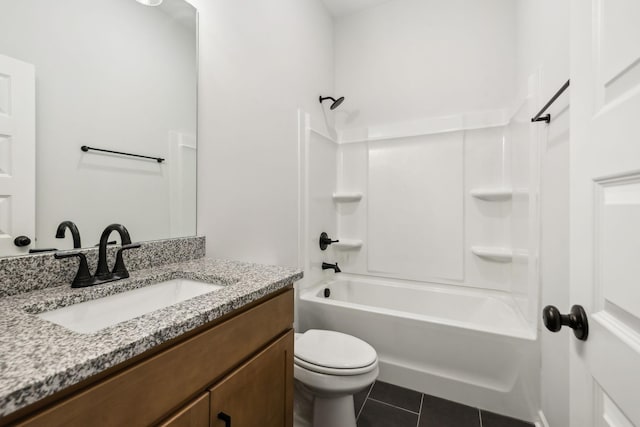 full bathroom with vanity, tub / shower combination, tile patterned floors, and toilet