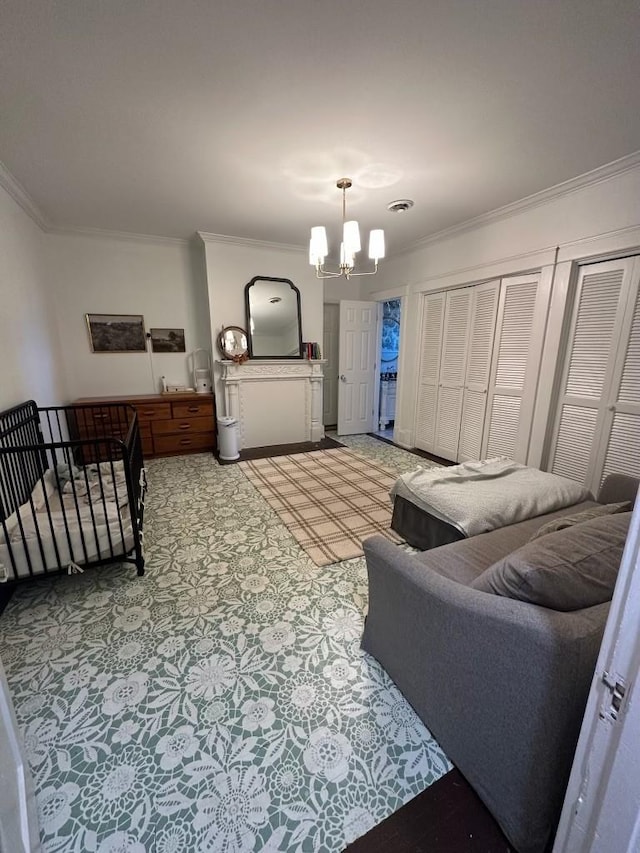 carpeted living room featuring an inviting chandelier and ornamental molding