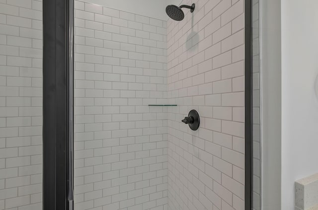 details with a tile shower