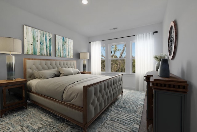 bedroom featuring dark colored carpet