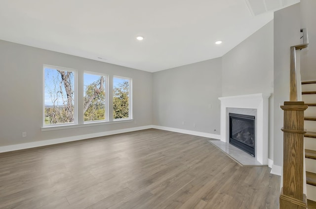 unfurnished living room with light wood-type flooring