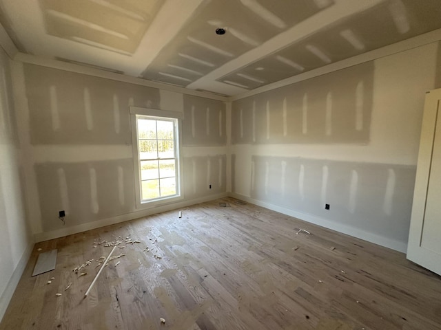 empty room with hardwood / wood-style floors