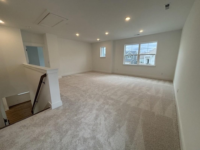 interior space featuring light colored carpet