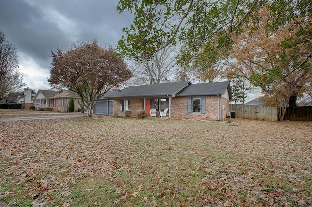 single story home featuring a garage