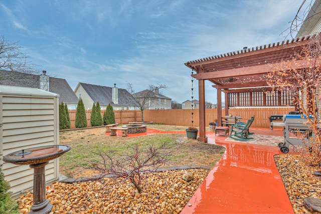 view of yard with an outdoor fire pit, a pergola, and a patio