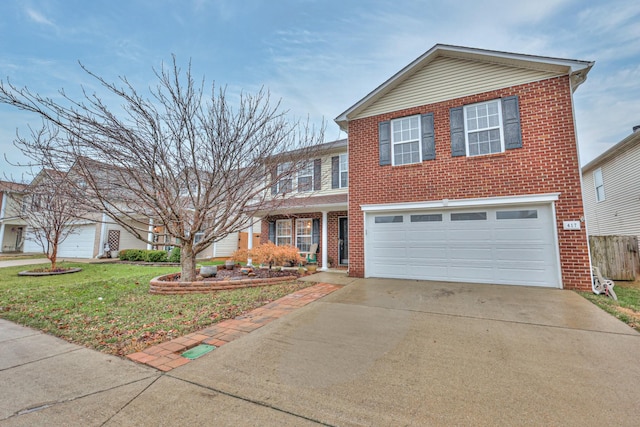 view of front facade with a garage and a front lawn