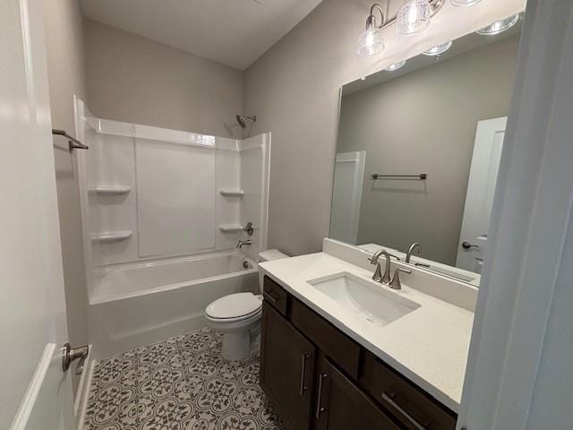 full bathroom with vanity, tile patterned floors, toilet, and washtub / shower combination