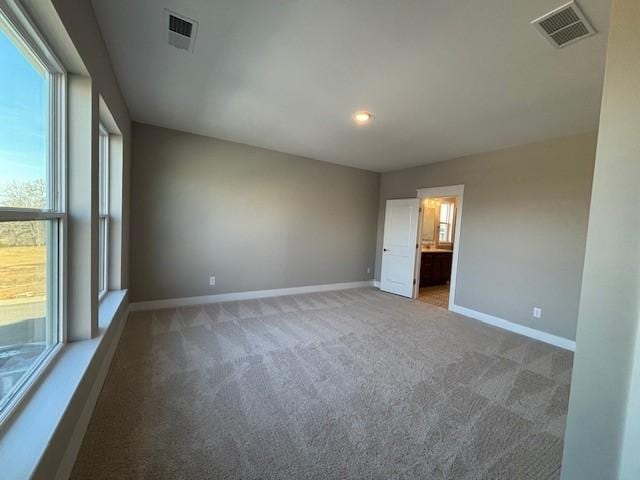 view of carpeted spare room