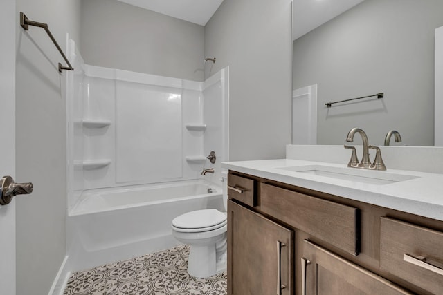 bathroom with vanity, tile patterned floors, toilet, and washtub / shower combination