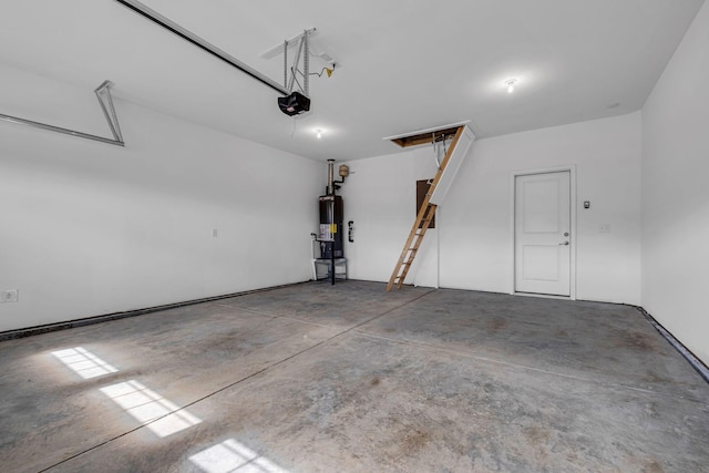 garage with a garage door opener and water heater