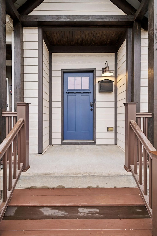 doorway to property featuring a porch