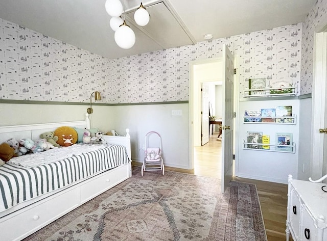 bedroom with wood-type flooring