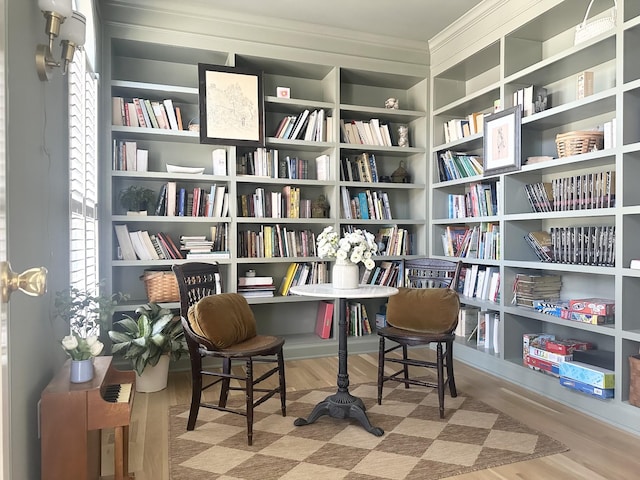 sitting room with hardwood / wood-style flooring