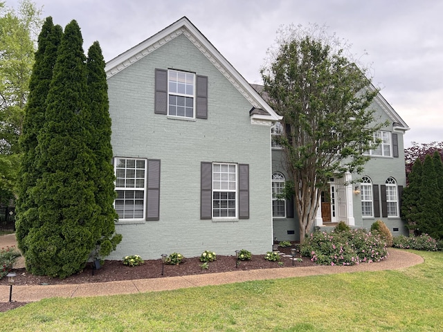 view of front property with a front yard