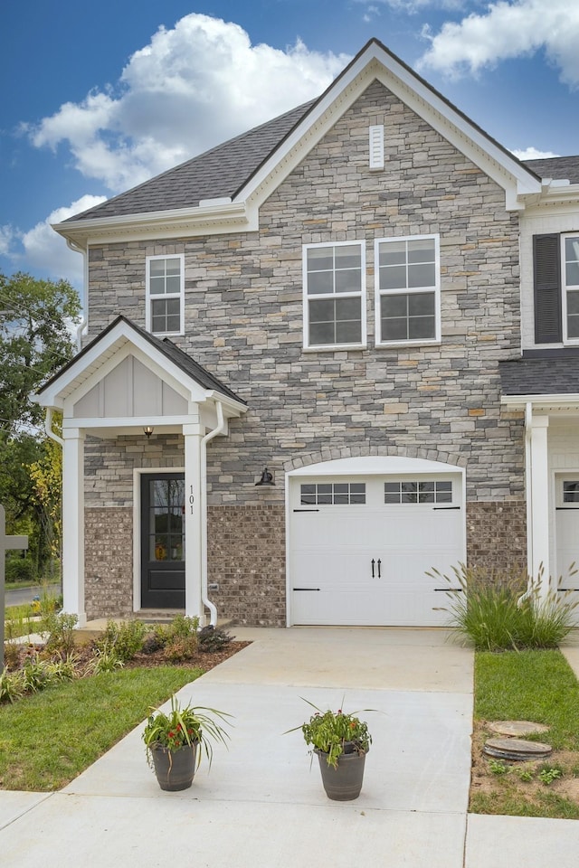 view of front of property with a garage