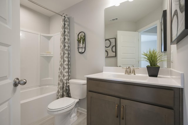 full bathroom with vanity, toilet, and shower / bath combo