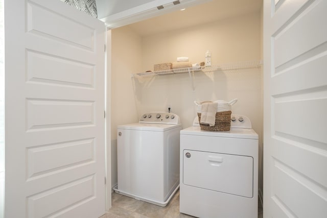 laundry area featuring washer and clothes dryer