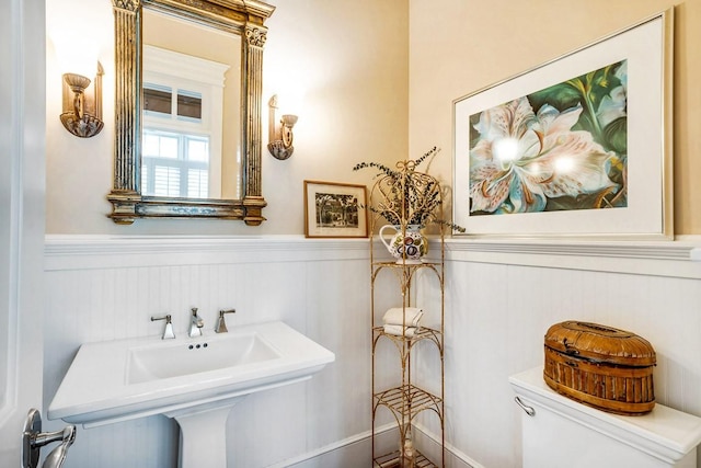 bathroom featuring sink and toilet