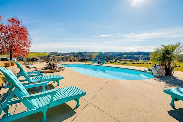 view of pool featuring a patio area