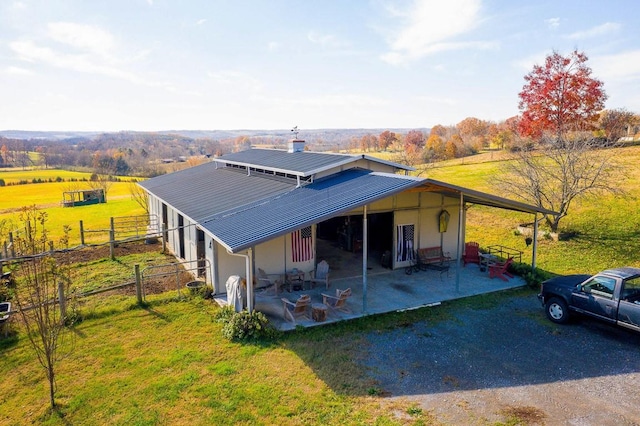 exterior space with a rural view