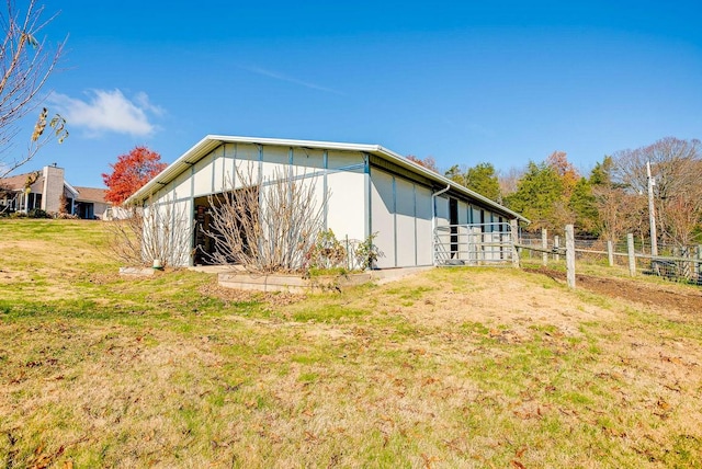 exterior space featuring an outbuilding