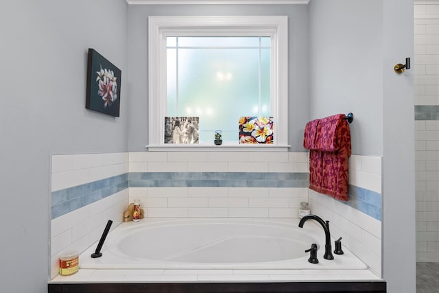 bathroom with tiled tub