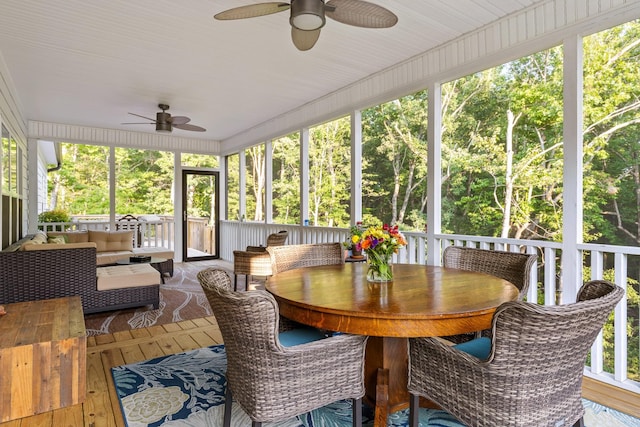 sunroom / solarium with ceiling fan