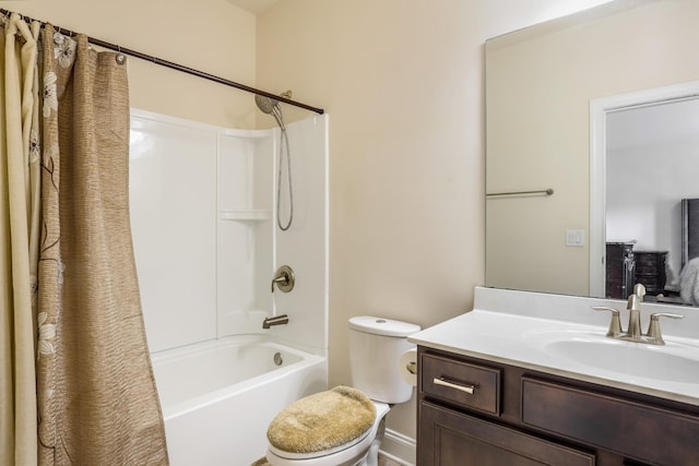 full bathroom featuring vanity, toilet, and shower / bath combo with shower curtain