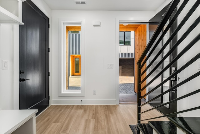 foyer entrance featuring light wood-type flooring