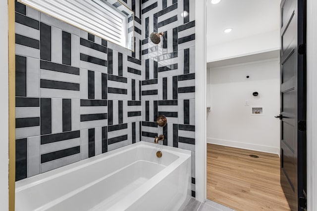 bathroom with hardwood / wood-style floors