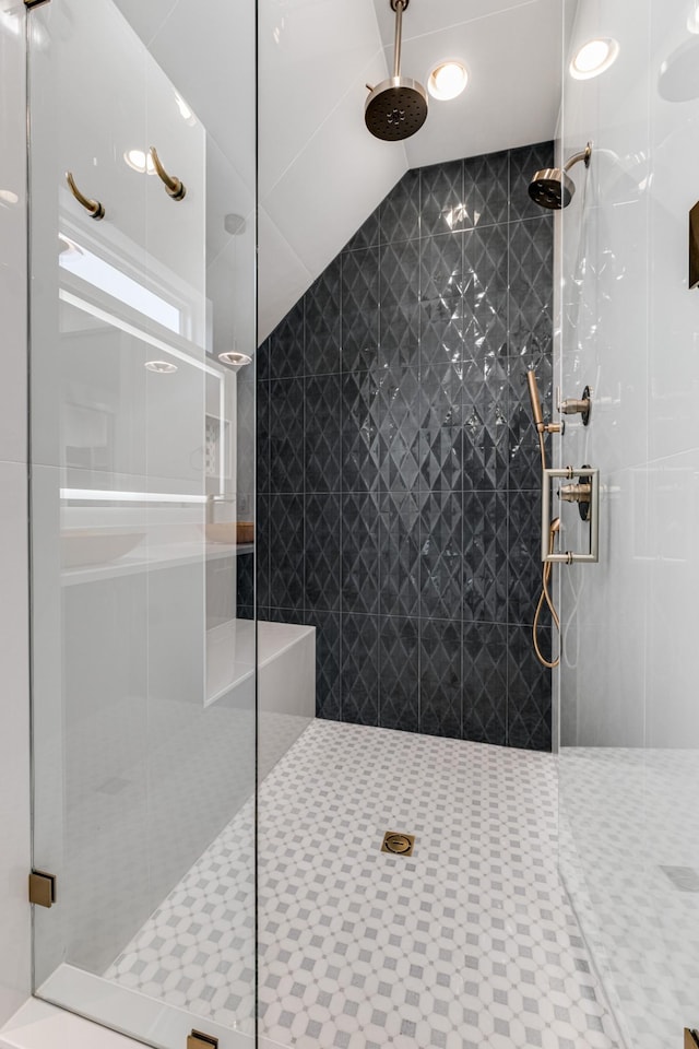 bathroom featuring an enclosed shower