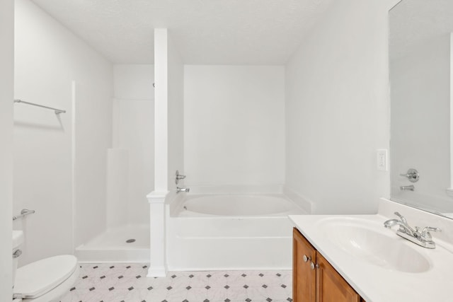 bathroom with toilet, a textured ceiling, vanity, a walk in shower, and a bath