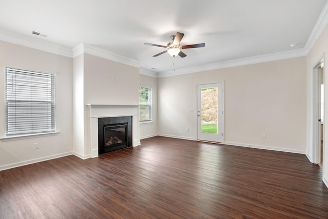 unfurnished living room featuring ceiling fan, ornamental molding, and dark hardwood / wood-style floors