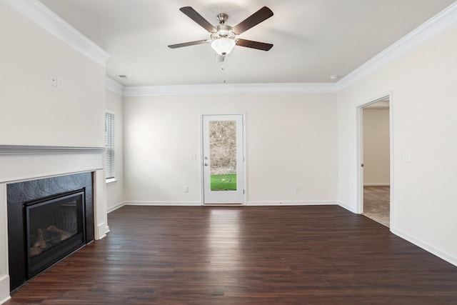 unfurnished living room with dark hardwood / wood-style flooring, ornamental molding, ceiling fan, and a high end fireplace