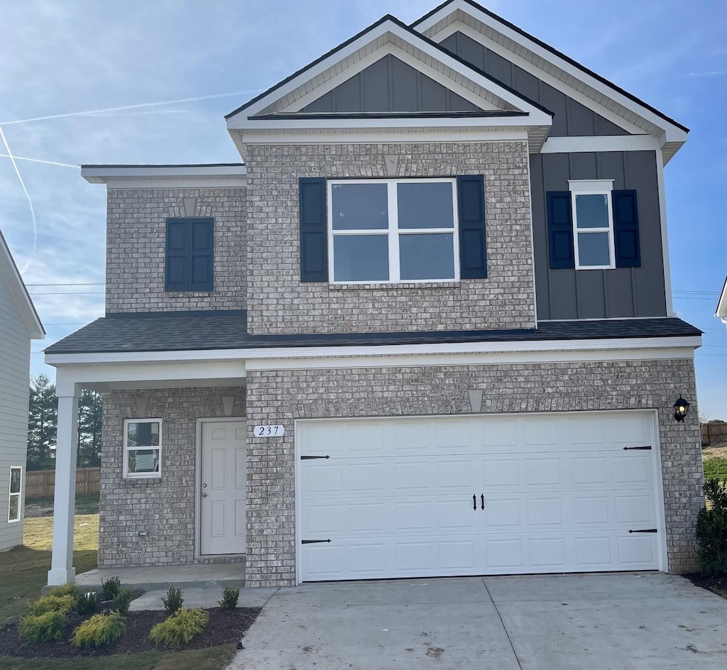 view of front of property featuring a garage