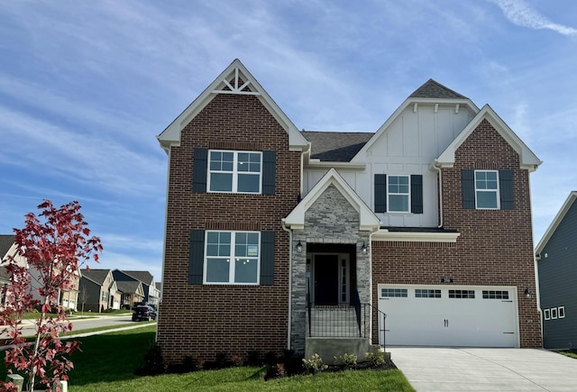 view of front of property with a garage and a front yard