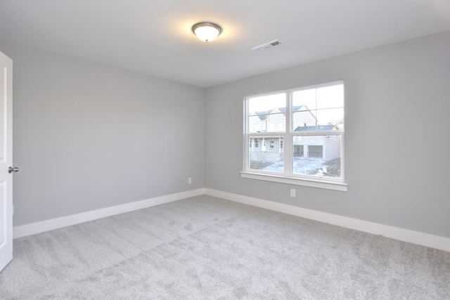 view of carpeted spare room