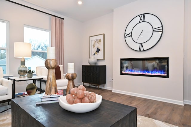 sitting room with hardwood / wood-style floors