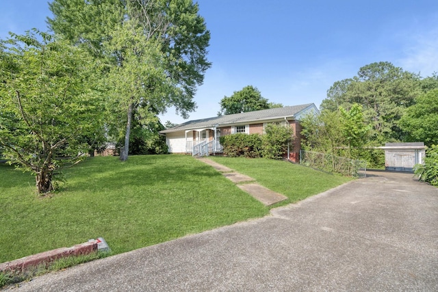 ranch-style house with a front yard