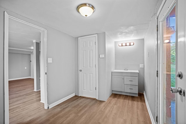 bathroom featuring vanity and hardwood / wood-style floors