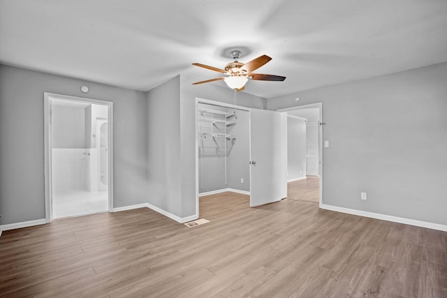 unfurnished room featuring ceiling fan and light hardwood / wood-style flooring