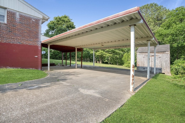 view of parking / parking lot featuring a carport and a lawn